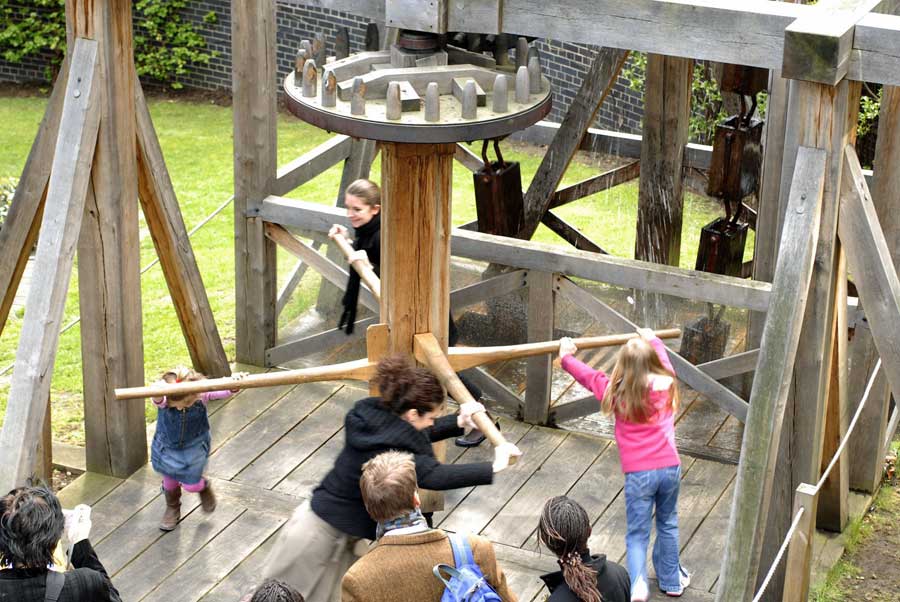  The full-size reconstruction of the Roman water-lifting machine (based on the bucket chain from the east well at Gresham Street), being demonstrated in the Rotunda Garden outside the Museum of London in 2006. Press-ganged into service are Meriel Jeater and Patrizia Pierazzo with two smaller assistants